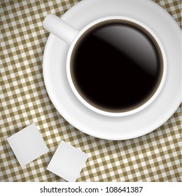 Cup of coffee on Brown tablecloth