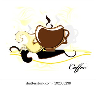 cup of coffee on white and yellow  cloth