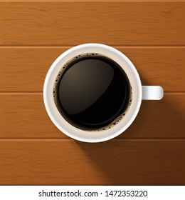 Cup of coffee on wooden background