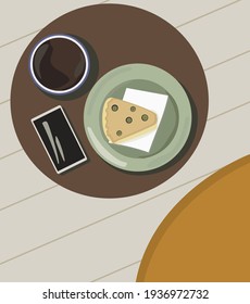A cup of coffee, a piece of pie and a telephone on the round table 