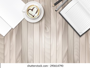 Cup Of Coffee With Shape Heart And Notebook On A Wooden Desk.