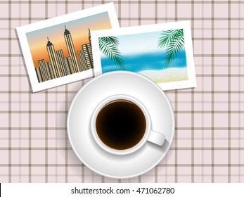 cup of coffee or tea and pictures of travel on the table