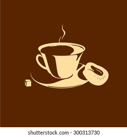 A cup of coffee with a twisted cookie
