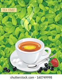A cup of fruit tea among green leaves