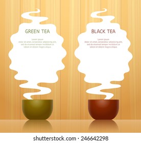 Cup for green tea and cup for black tea, steam above them with place for texts, on background with wooden pattern