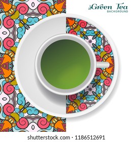 Cup of green tea with doodle ornament on a saucer and hand drawn seamless floral pattern. Business coffee break or tea time concept, interior background. Isolated cup and plate decor elements