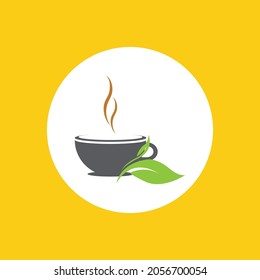 a cup of green tea leaves on a yellow background