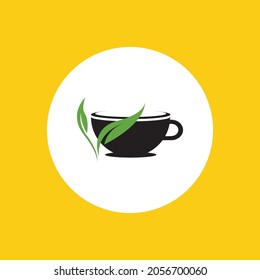 a cup of green tea leaves on a yellow background