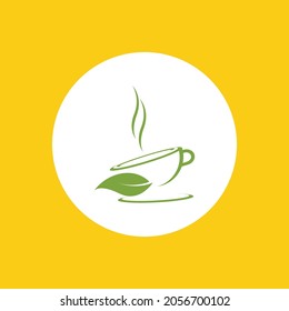 a cup of green tea leaves on a yellow background
