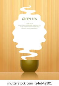 Cup for green tea, steam above it with place for text, on background with wooden pattern