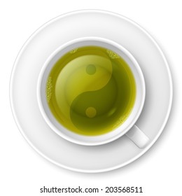 Cup of green tea with traditional Chinese Yin-Yang symbol