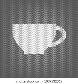 Cup sign. Vector. White knitted icon on gray knitted background. Isolated.
