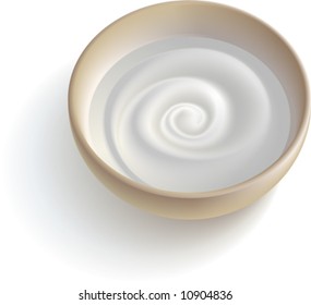 A cup with some white creamy substance.