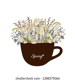 Cup with spring flowers on white background