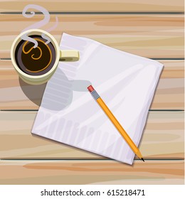 Cup of steaming coffee and a napkin and pencil sitting on a wood plank table