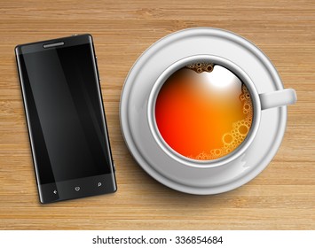 A cup of tea with a cellphone