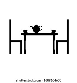 taza de té en la mesa con ilustración de la silla