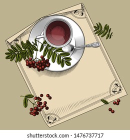 Cup with tea, small spoon saucer and rowan branch on paper sheet with a decorative frame. Vintage engraving black and white stylized drawing. Vector 

illustration
