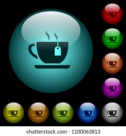Cup of tea with teabag icons in color illuminated spherical glass buttons on black background. Can be used with black or dark templates