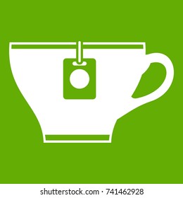 Cup with teabag icon white isolated on green background. Vector illustration
