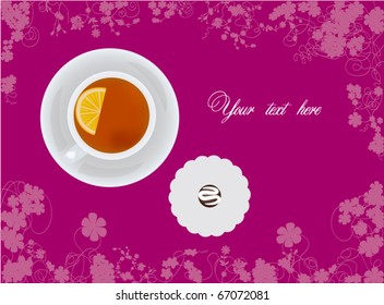 Cup of tee with candy on floral background