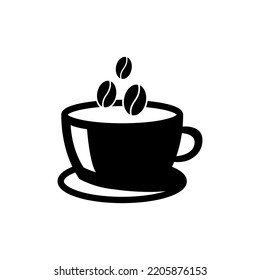 una taza de tres granos de café negros