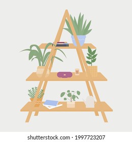 Cupboard with shelves isolated on the gray background. Cupboard with books, potted plants, candle and portable speaker. Design element of cozy house interior. Flat vector illustration.