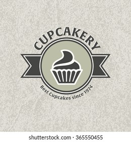 Cupcake bakery logo template. Two-tone version of cupcake vector icon on white and black background. Small cake designed to serve one person.