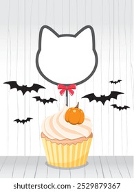 Cupcake with blank cat tag on background.Happy Halloween day.