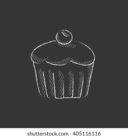 Cupcake with cherry. Drawn in chalk icon.
