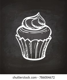 Cupcake with cream. Chalk sketch on blackboard. Hand drawn vector illustration. Retro style.