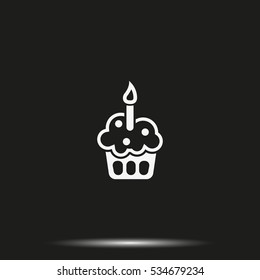 Cupcake with festive candle icon.