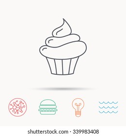 Cupcake icon. Dessert cake sign. Delicious bakery food symbol. Global connect network, ocean wave and burger icons. Lightbulb lamp symbol.
