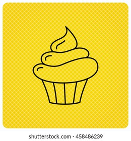 Cupcake icon. Dessert cake sign. Delicious bakery food symbol. Linear icon on orange background. Vector