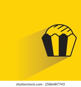 cupcake icon with drop shadow on yellow background