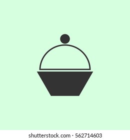 Cupcake icon flat. Grey vector symbol on green background