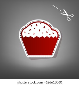 Cupcake sign. Vector. Red icon with for applique from paper with shadow on gray background with scissors.
