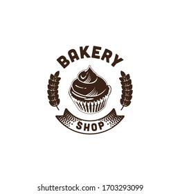 A cupcake, vintage bakery logo Ideas. Inspiration logo design. Template Vector Illustration. Isolated On White Background 