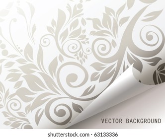  Curled corner of floral background page.