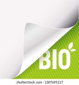Curled corner of white paper on a green right bottom angle background. Bio slogan sign with leaves. Vector illustration.