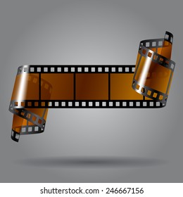 Curled photo film strip on gray background. Movies concept. Vector illustration