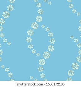 Curls of yellow flowers on a blue background. Seamless vector pattern.