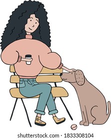 curly girl in a pink sweater and jeans stroking a dog while sitting on a bench with a cup of coffee in her hands