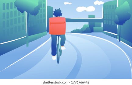 Curly guy on a bicycle rear view against the backdrop of the city. Male courier with home delivery.