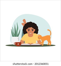 Curly haired girl with cup of coffee is reading a book on the floor. Her curious cat is looking into the book. Cozy home, education concept. Vector illustration in flat style.