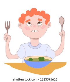 curly red-haired boy holding a spoon and fork. he sits in front of a plate of soup
