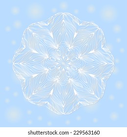 Curly snowflake. Blue winter background.
