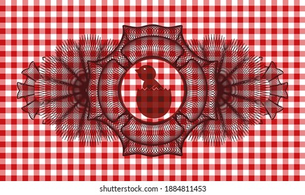 Currency decoration baby chick coming out of the egg icon inside red checkered tablecloth realistic emblem. Restaurant luxurious background. Artistic illustration. 