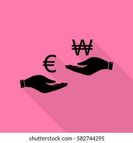 Currency exchange from hand to hand. Euro and Won. Black icon with flat style shadow path on pink background.