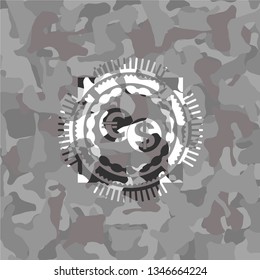 currency exchange icon inside grey camouflage emblem